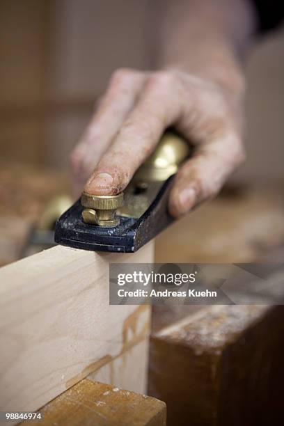 woodworkers hand with tool, close up. - andreas kuehn bildbanksfoton och bilder