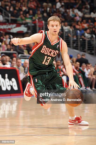 Luke Ridnour of the Milwaukee Bucks drives the ball against the Los Angeles Clippers at Staples Center on March 17, 2010 in Los Angeles, California....