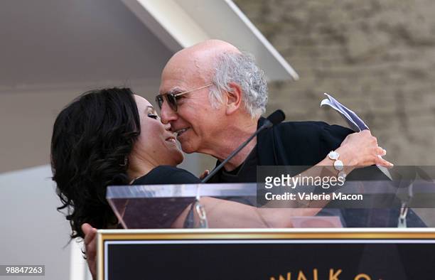 Actress Julia Louis-Dreyfus and comedian Larry David attend the Hollywood Walk of Fame ceremony honoring Julia Louis-Dreyfus on May 4, 2010 in...