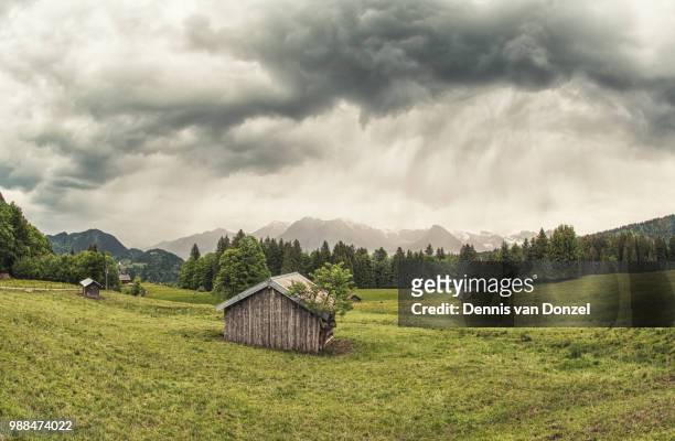 storm above the alps - storm dennis stock pictures, royalty-free photos & images
