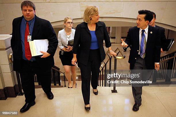 Sen. Mary Landrieu talks with fellow Louisana lawmaker Rep. Anh "Joseph" Cao after receiving a briefing from Obama Administration officials about the...