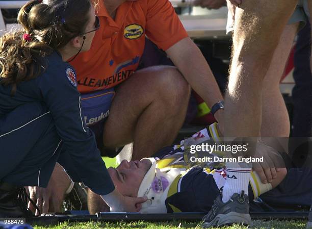 Shane Muspratt of the Cowboys is carted from the field after being injured against the Broncos during the round 14 NRL match between the Brisbane...