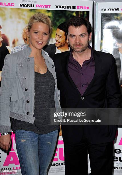 Actress Virginie Efira and actor Clovis Cornillac attend the Premiere of 'L'amour C'est Mieux a Deux' on May 4, 2010 in Paris, France.