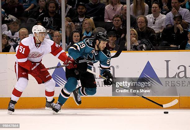 Ryane Clowe of the San Jose Sharks skates away from Valtteri Filppula of the Detroit Red Wings in Game Two of the Western Conference Semifinals...