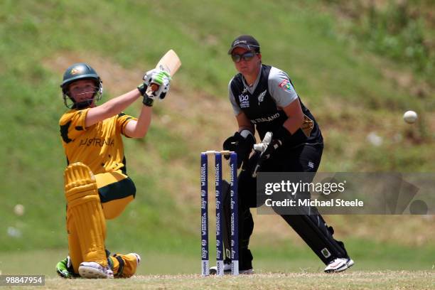 Jessica Cameron of Australia hits to the legside as wicketkeeper Rachel Priest looks on during the ICC T20 Women's World Cup warm up match between...