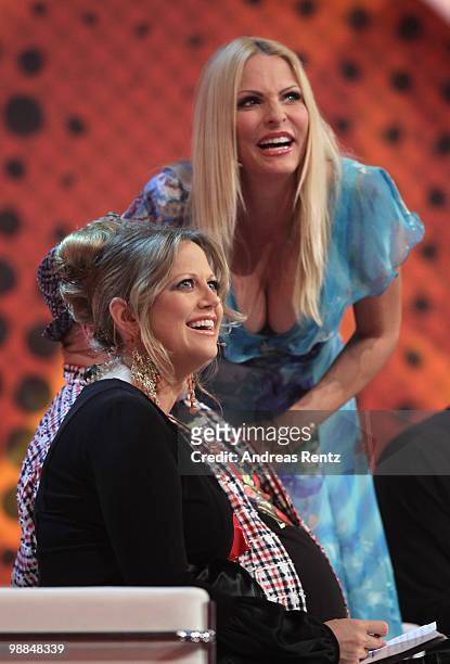 Pregnant TV host Barbara Schoeneberger and Sonya Kraus looks on during the SKL show 'Tag des Gluecks' at Tempodrom on May 4, 2010 in Berlin, Germany.