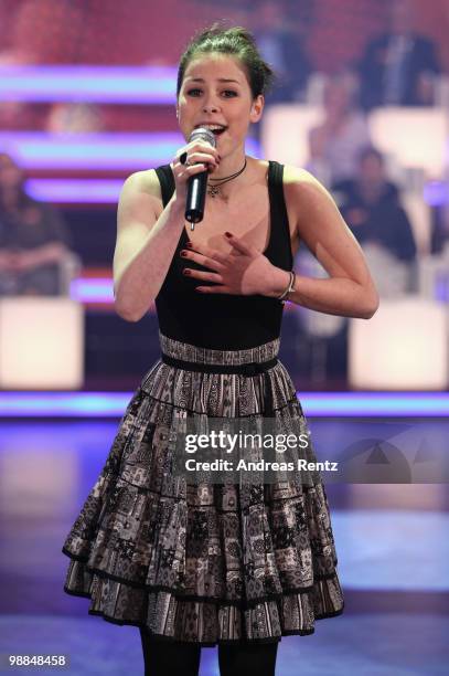 Singer Lena Meyer-Landrut performs during the SKL show 'Tag des Gluecks' at Tempodrom on May 4, 2010 in Berlin, Germany.