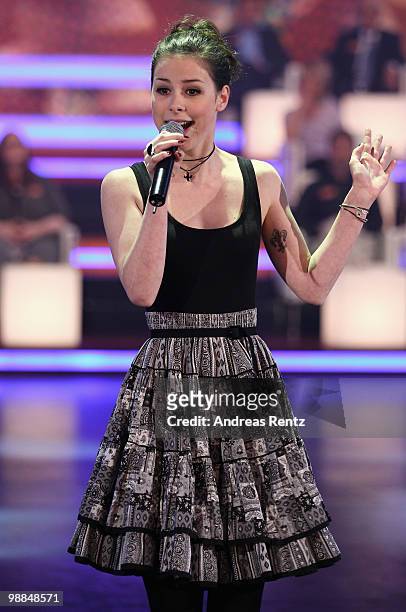 Singer Lena Meyer-Landrut performs during the SKL show 'Tag des Gluecks' at Tempodrom on May 4, 2010 in Berlin, Germany.
