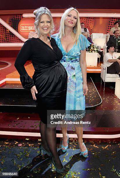 Pregnant TV host Barbara Schoeneberger and Sonya Kraus pose during the SKL show 'Tag des Gluecks' at Tempodrom on May 4, 2010 in Berlin, Germany.