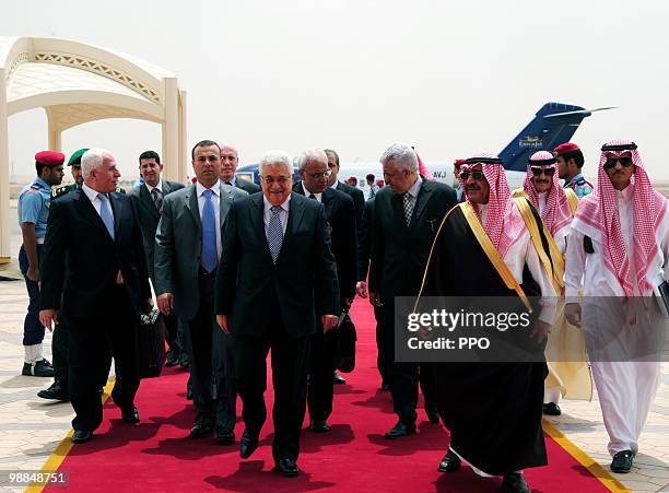 In this handout image supplied by the Palestinian Press Office , Palestinian President Mahmoud Abbas is received by Prince Muqrin bin Abdul Aziz May...