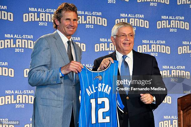 Orlando Magic President Bob Vander Weide and NBA Commissioner David Stern hold up a jersey after announcing that Orlando will host the 2012 NBA...