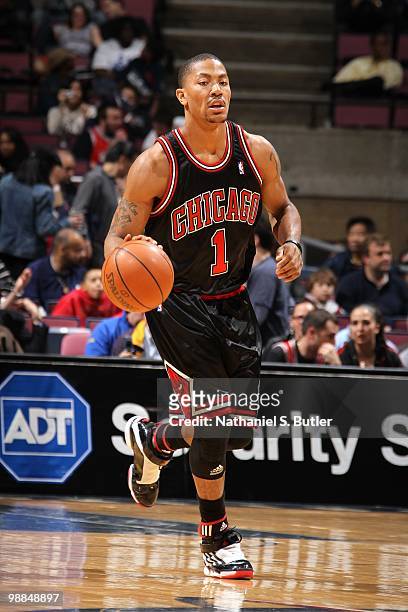 Derrick Rose of the Chicago Bulls moves the ball up court during the game against the New Jersey Nets at the IZOD Center on April 9, 2010 in East...