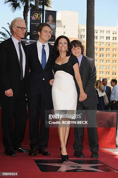Actress Julia Louis-Dreyfus poses with her family at her Walk of Fame star ceremony, in the Hollywood section of Los Angeles, May 4, 2010. From left...