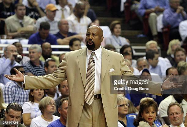 Head coach Mike Woodson of the Atlanta Hawks protests to an official while taking on the Orlando Magic in Game One of the Eastern Conference...