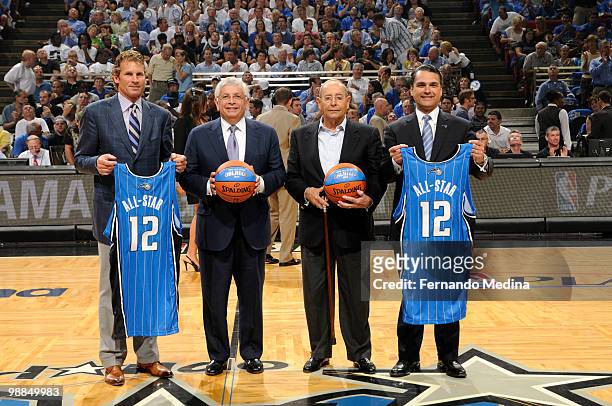 Commissioner David Stern presents the honor of hosting the 2012 NBA All-Star game to CEO Bob Vander Weide, Chairman Rich DeVos and COO Alex Martins...