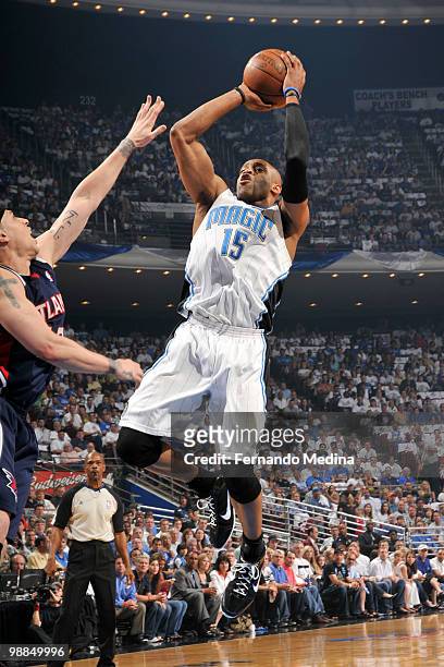 Vince Carter of the Orlando Magic shoots against Zaza Pachulia of the Atlanta Hawks in Game One of the Eastern Conference Semifinals during the 2010...