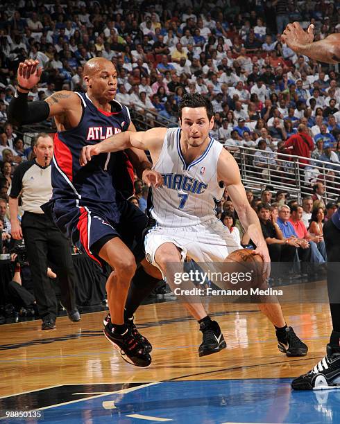 Redick of the Orlando Magic drives against Maurice Evans of the Atlanta Hawks in Game One of the Eastern Conference Semifinals during the 2010 NBA...