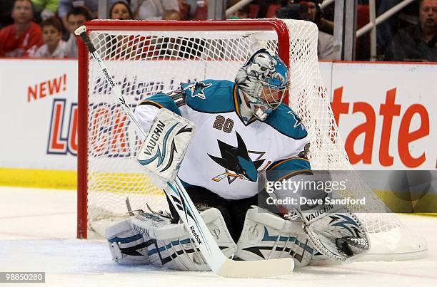 Evgeni Nabokov of the San Jose Sharks makes a glove save against the Detroit Red Wings in Game Three of the Western Conference Semifinals during the...