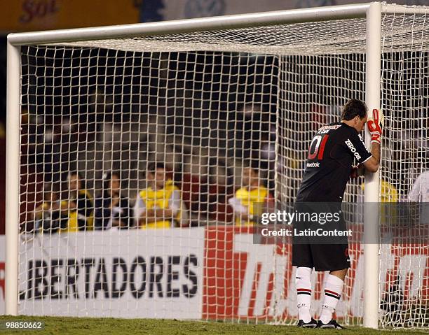 Goalkeeper Rogerio Ceni of Sao Paulo prepares to save a penalty kick during their Libertadores Cup soccer match against Universitario de Deportes at...