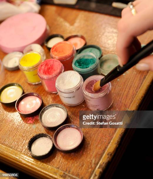 Assistants prepare make-up backstage ahead of the Alice McCall collection show on the third day of Rosemount Australian Fashion Week Spring/Summer...