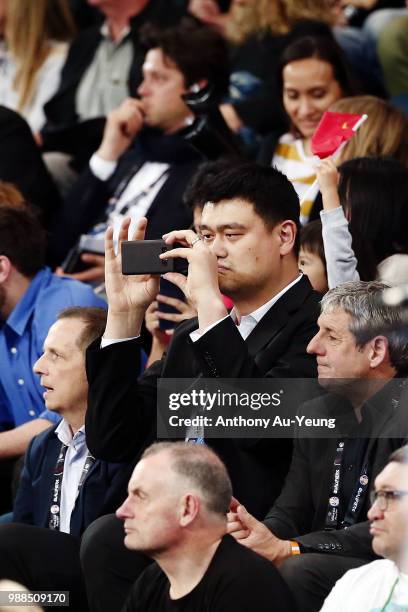 Legend and President of the Chinese Basketball Association Yao Ming watches the action during the FIBA World Cup Qualifying match between the New...