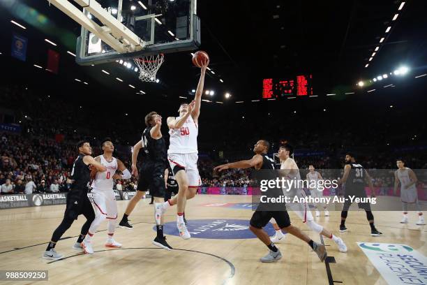 Abudushalamu Abudurexiti of China goes to the basket during the FIBA World Cup Qualifying match between the New Zealand Tall Blacks and China at...