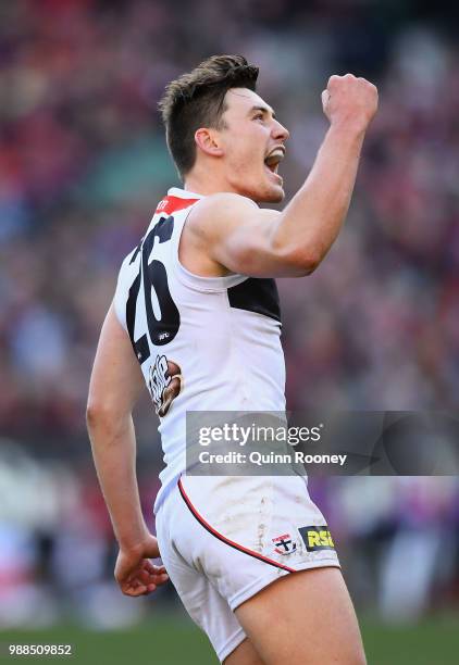 Josh Battle of the Saints celebrates kicking a goal during the round 15 AFL match between the Melbourne Demons and the St Kilda Saints at Melbourne...