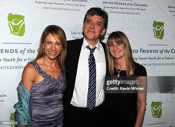 Board member Kimberly Marteau Emmerson, TV personality Craig Ferguson, and board member Ande Rosenblum arrive at the United Friends of the Children's...