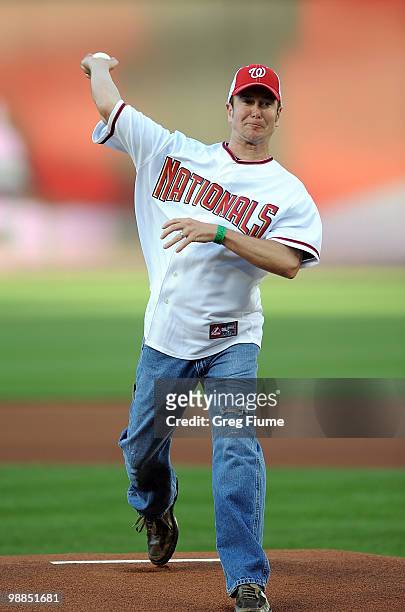 Kurt Busch throws out the opening pitch before the game between the Washington Nationals and the Atlanta Braves at Nationals Park on May 4, 2010 in...