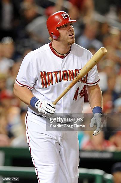 Adam Dunn of the Washington Nationals hits a home run in the sixth inning against the Atlanta Braves at Nationals Park on May 4, 2010 in Washington,...