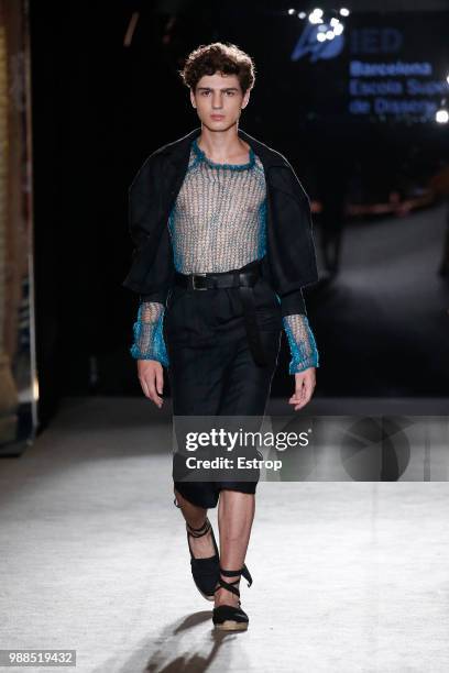 Model walks the runway at the IED Barcelona show during the Barcelona 080 Fashion Week on June 29, 2018 in Barcelona, Spain.