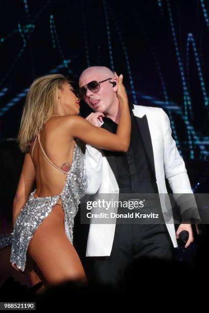 Pitbull performs with back up dancers in concert in the Etess Arena for the grand opening at Hard Rock Hotel & Casino Atlantic City on June 30, 2018...