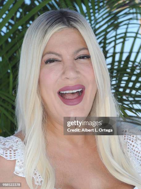 Actress Tori Spelling arrives for Columbia Pictures And Sony Pictures Animation's World Premiere Of "Hotel Transylvania 3: Summer Vacation" held at...