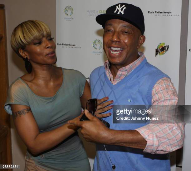 Mary J. Blige and Russell Simmons visit P.S. 165 on May 4, 2010 in New York City.