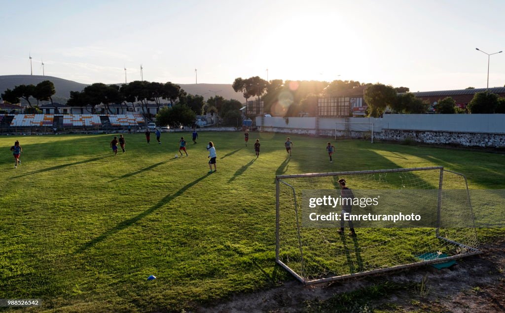 Football training at sunset in Alacati.