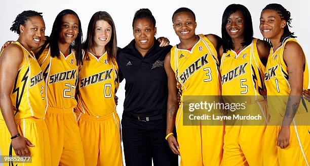 Alexis Hornbuckle, Marion Jones, Shanna Crossley, Tammy Bagby, Natasha Lacy, Scholanda Robinson and Shavonte Zellous of the Tulsa Shock pose for...