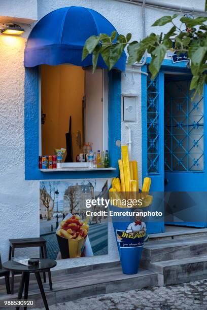 small shop selling french fries in alacati. - emreturanphoto stock pictures, royalty-free photos & images