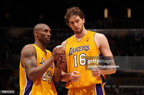 Kobe Bryant of the Los Angeles Lakers directs teammate Pau Gasol while taking on the Utah Jazz in Game Two of the Western Conference Semifinals...