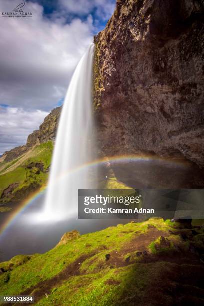 rainbow waterfall - rainbow waterfall stock pictures, royalty-free photos & images