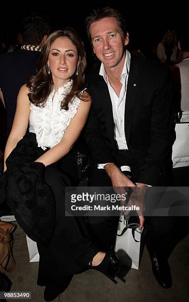Former Australian cricketer Glenn MCGrath and partner Sara Leonardi sit in the front row for the Bianca Spender collection show on the third day of...