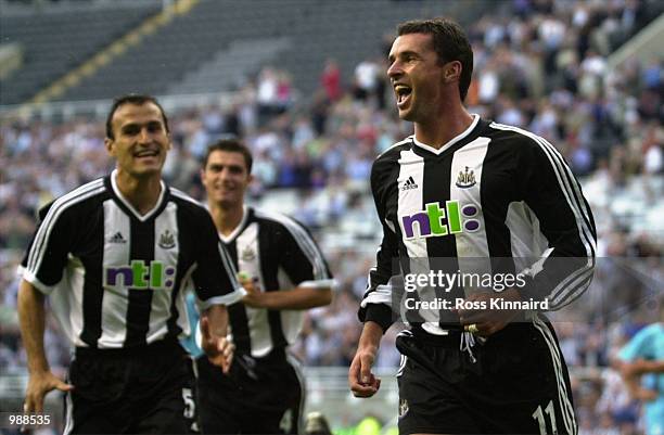 Gary Speed of Newcastle is congratulated by Nikos Dabizas after scoring the opening goal during the Intertoto Cup tie between Newcastle United and...