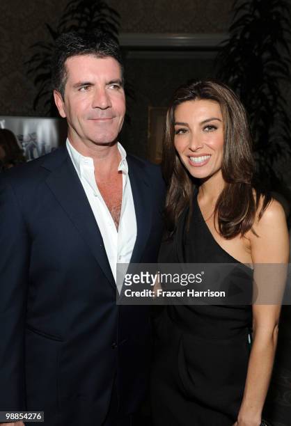 Television personality Simon Cowell and his fiancee Mezhgan Hussainy attend the BritWeek UKTI Business Innovation Awards where he received a special...