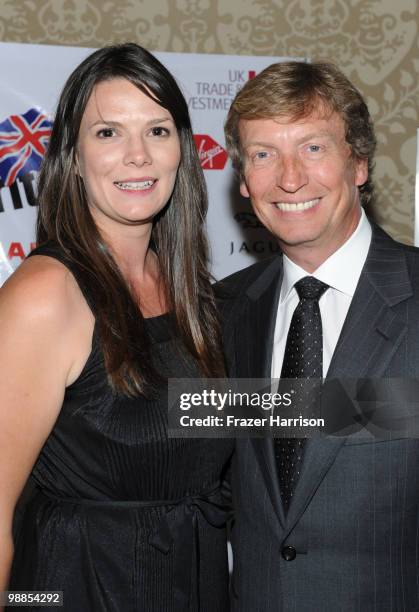 Television personality and BritWeek President Nigel Lythgoe poses with Fiona Francois of Uk Trade and Investment at the BritWeek UKTI Business...