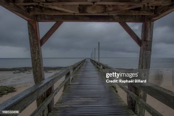 pontoon of luc-sur-mer - billard stock pictures, royalty-free photos & images