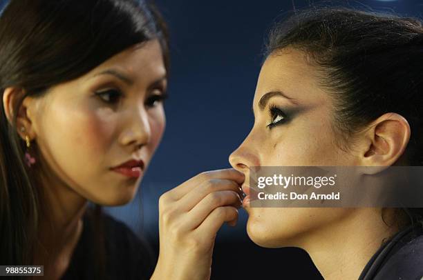 Model prepares backstage ahead of the Alex Perry show on the second day of Rosemount Australian Fashion Week Spring/Summer 2010/11 off-site at Fox...