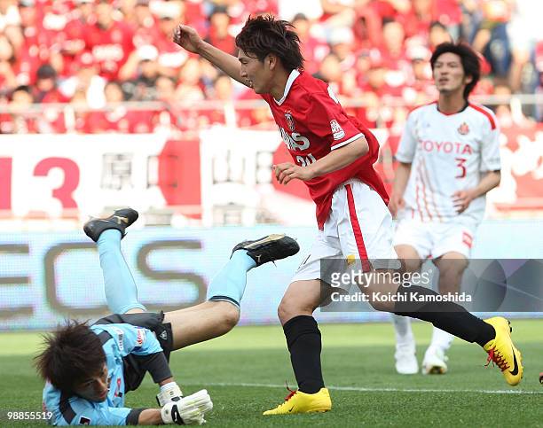 Genki Haraguchi of Urawa Red Diamonds celebrates after scoring his goal during the J. League match between Urawa Red Diamonds and Nagoya Grampus at...