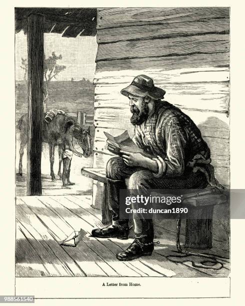 cowboy reading a letter from home, 19th century - sitting on porch stock illustrations