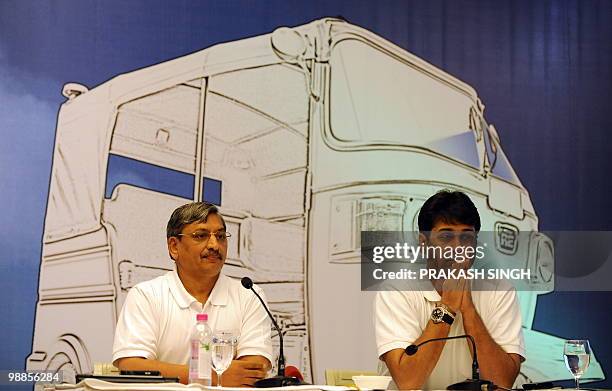 Managing Director of Bajaj Auto Limited Rajiv Bajaj and CEO Commercial Vehicle of Bajaj Auto R. C. Maheshwari listen to a question during a press...