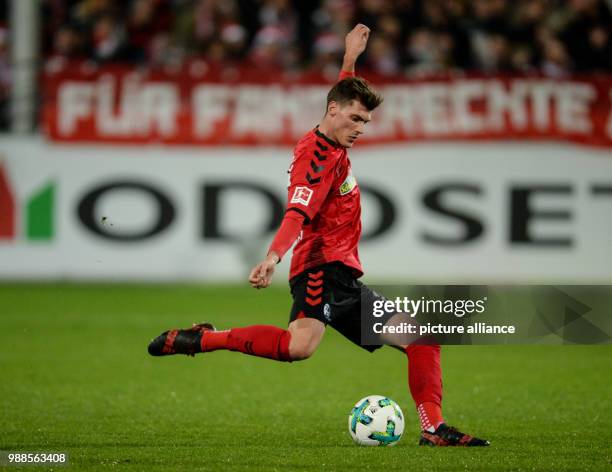 Freiburg's Pascal Stenzel plays the ball during the German Bundesliga soccer match between SC Freiburg and Hamburger SV at the Schwarzwald Stadium in...