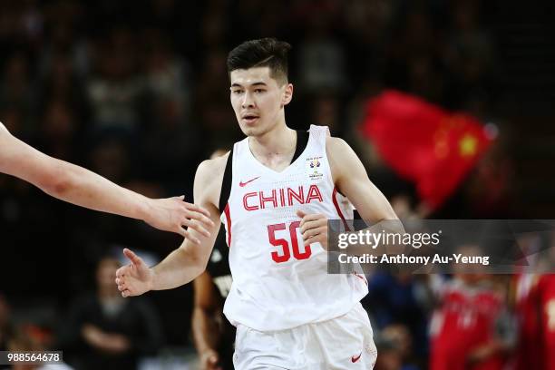 Abudushalamu Abudurexiti of China celebrates after scoring a basket during the FIBA World Cup Qualifying match between the New Zealand Tall Blacks...